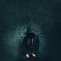 Spooky evil criminal person with hooded jacket dissolving Royalty Free Stock Photo