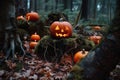 In a spooky Halloween forest, a carved pumpkin lantern with a funny and spooky face glows brightly in the dark Royalty Free Stock Photo