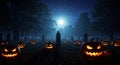 Spooky Halloween Graveyard with Jack-o\'-Lanterns at Night Royalty Free Stock Photo
