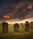 Spooky Halloween tombstones under stormy sky