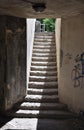 Spooky narrow corridor leading upstairs Royalty Free Stock Photo