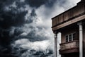 Spooky old house concept with cloud strom background and copy s Royalty Free Stock Photo