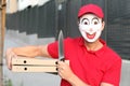Spooky pizza delivery guy with a knife
