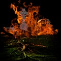Spooky Scary Graveyard With Burining Fire and Flames Engulfing G Royalty Free Stock Photo