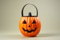 Spooky season ready Halloween pumpkin bucket against a white canvas
