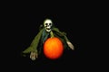 Spooky Skeleton on Halloween evening and pumpkin Royalty Free Stock Photo