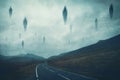 A spooky supernatural concept. Of spirits floating above a road in the mountains at night. With a grunge, textured edit Royalty Free Stock Photo