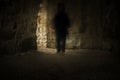 Spooky tunnel or basement with dark blurred ghost Royalty Free Stock Photo