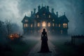A spooky woman walking towards a dark and horrific mansion. Royalty Free Stock Photo