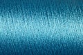 Spool of blue thread macro background Royalty Free Stock Photo