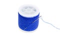 Spool of Blue Thread on a White Background Royalty Free Stock Photo