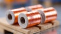 A spool of copper wire sitting on top of a wooden pallet Royalty Free Stock Photo
