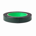 A spool of green double-sided tape. Isolated on a white background Royalty Free Stock Photo