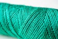 Spool of green thread. Royalty Free Stock Photo