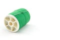 Spool of green thread and needle Royalty Free Stock Photo