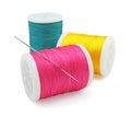 Spool of pink yellow and green thread with needle, Bobbins thread, Material of sewing tool, Cut out with clipping path Royalty Free Stock Photo