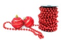 Spool of red beads and two christmas balls Royalty Free Stock Photo