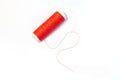 Spool of red thread isolated on white background Royalty Free Stock Photo