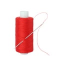 Spool of red sewing thread with needle isolated on white Royalty Free Stock Photo