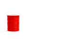 A spool of red sewing thread on a white background Royalty Free Stock Photo