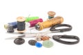 Spool of thread with buttons and scissors Royalty Free Stock Photo