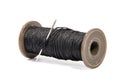 Spool of thread and needle isolated on white Royalty Free Stock Photo