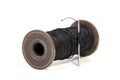 Spool of thread and needle isolated on white Royalty Free Stock Photo