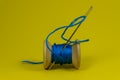 Spool of thread with needle Royalty Free Stock Photo