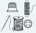Spool with threads, sewing button and thimble