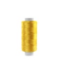 Spool of yellow sewing thread isolated on white