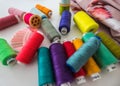 Spools with colored cotton threads for sewing, sewing accessories, needles set Royalty Free Stock Photo