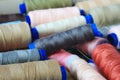 Spools of multi-colored threads lie in a box Royalty Free Stock Photo