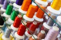Spools of colored thread for sewing machine Royalty Free Stock Photo