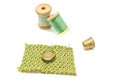 Spools of green thread, button and thimble Royalty Free Stock Photo