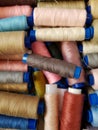 Spools of multi-colored threads lie in a box Royalty Free Stock Photo