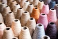 spools of natural linen thread ready for weaving Royalty Free Stock Photo