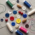 Spools of thread, buttons, needles, and two small red cherrie Royalty Free Stock Photo
