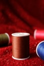 Spools of Thread on Fabric Royalty Free Stock Photo