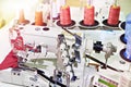 Spools of thread and sewing coverstitch machine Royalty Free Stock Photo