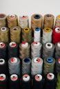 Spools of thread on a stand in a sewing workshop Royalty Free Stock Photo