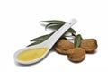 Spoon with almond oil. Royalty Free Stock Photo