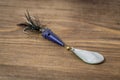 Spoon bait, lures, flies, tackle for catching or fishing a predatory fish on deck wood background Royalty Free Stock Photo