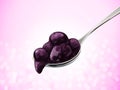 Spoon of blueberry jam