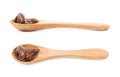 Spoon of chocolate candies isolated Royalty Free Stock Photo