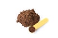 Spoon and chocolate protein powder on white, top view Royalty Free Stock Photo