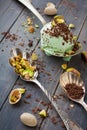 Spoon with chopped pistachios and ice cream Royalty Free Stock Photo