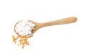 Spoon with corn starch and kernels on white background Royalty Free Stock Photo