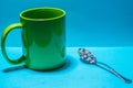 Spoon and cup with microplastics Royalty Free Stock Photo