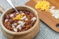 Spoon in delicious bowl of chili.