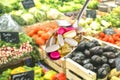 Spoon with dietary supplements on blurred fruit background Royalty Free Stock Photo